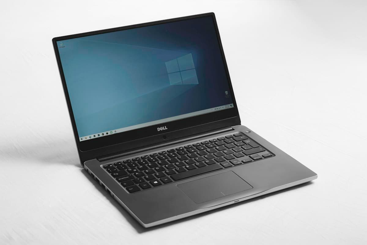 Sleek laptop on clean surface demonstrating hardware troubleshooting and system performance optimization